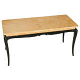 A Birds-Eye Maple Burr coffee table on ebonised base